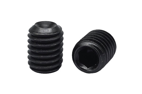 An oxidized black hexagon socket set screw with cup point